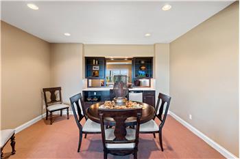Lower level entertainment room with wet bar