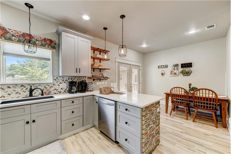 Kitchen facing into dining room.