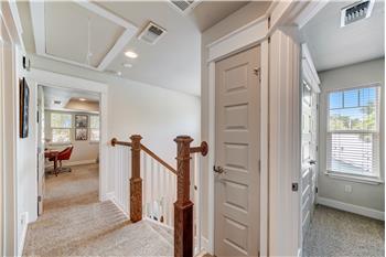 Upstairs landing space. 2 Linen closets in the hallway.