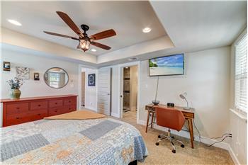 Master bedroom with ensuite entry with pocket door.