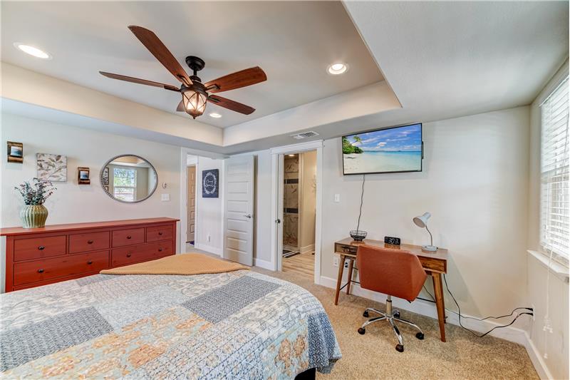 Master bedroom with ensuite entry with pocket door.