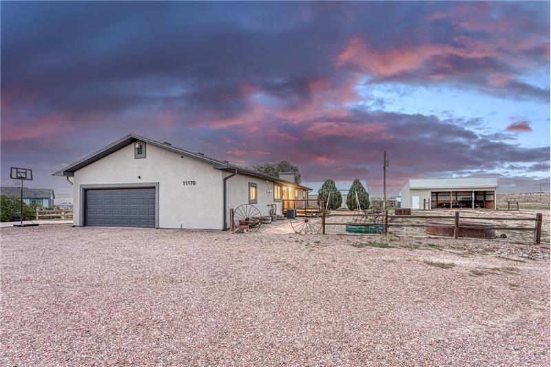Set on 5.64 acres with 2,785 sf of well-designed living space, featuring an open floor plan with  spacious main-level bedrooms.