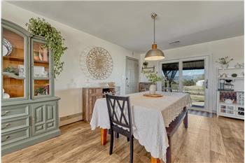 Spacious Dining Room with walk out to the backyard.