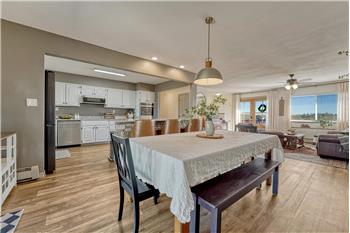 The Dining Area is conveniently located off the Kitchen making it easy for food service and clean up.