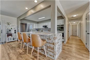 Beautiful Gourmet Island Kitchen with breakfast bar to enjoy your morning coffee and chats with the chef.