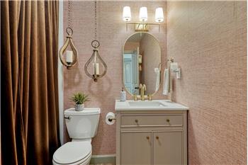 Shower Bathroom with vanity, mirror, and tiled shower.