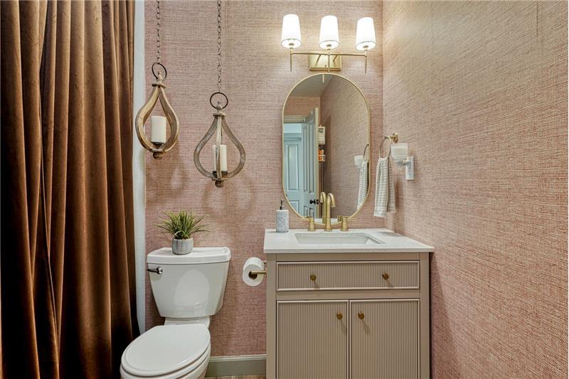 Shower Bathroom with vanity, mirror, and tiled shower.