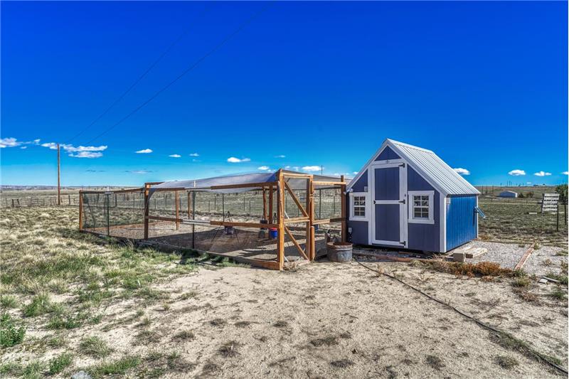 Enclosed chicken house and runs.