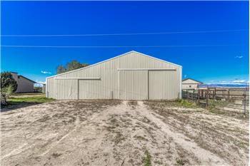 Huge barn for storage, workshop, or RV parking.