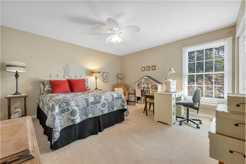 Bedroom #2 upstairs is spacious with double closet and ceiling fan.