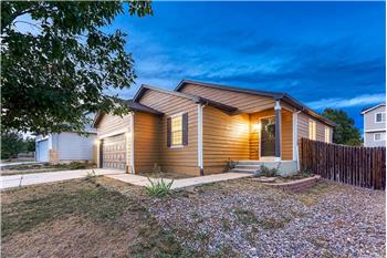 Low maintenance landscaping and covered front porch.