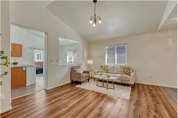 View into the Kitchen and Dining Area from the Living Room.