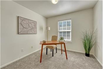 Bedroom #1 (currently an office) with new carpet.