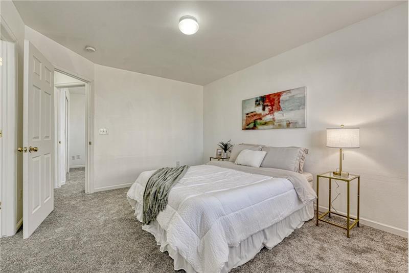 The Primary Bedroom offers a generous walk in closet and adjoining Shower Bathroom.