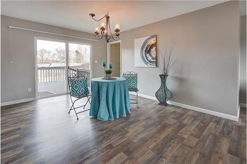 Dining area provides a walk-out to the back deck and offers amazing mountain views!