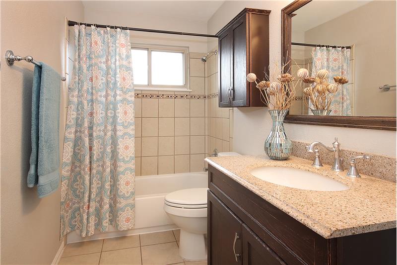 Main level bath with ample storage