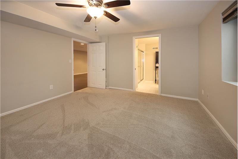 Adjoining 3/4 bath with a pocket door