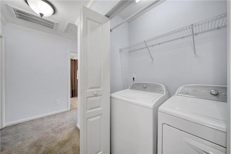 Laundry closet in upstairs hallway