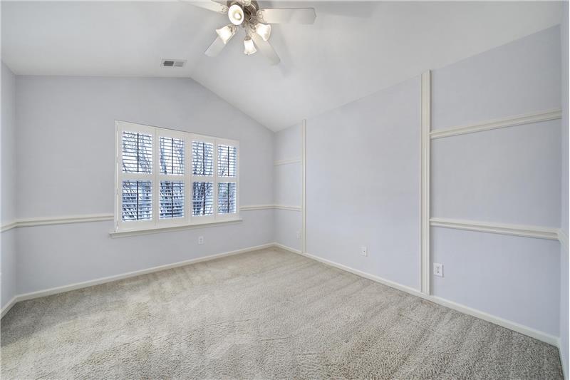 Vaulted ceiling in Primary Suite