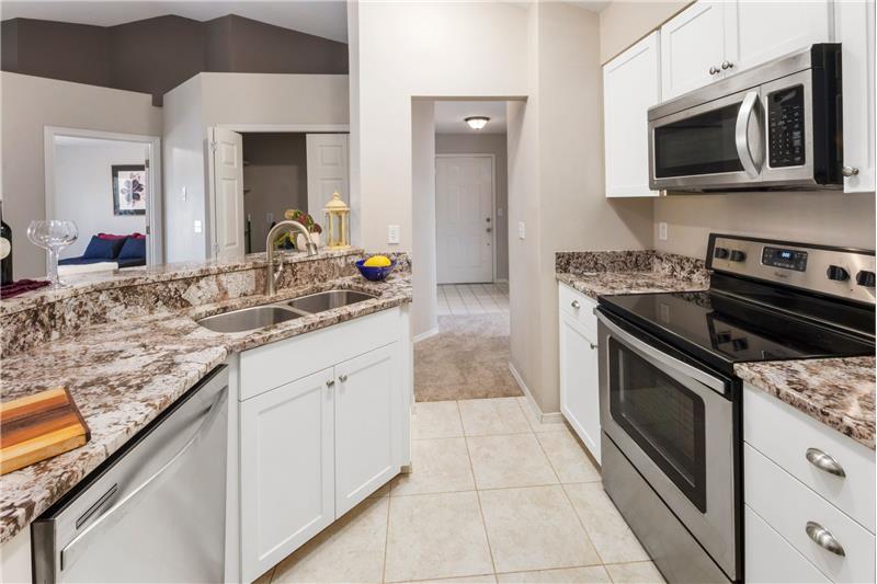 Granite countertops, and stainless appliances