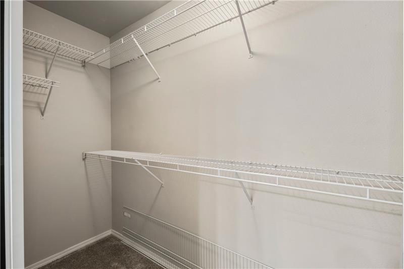 HUGE walk in closet with primary.