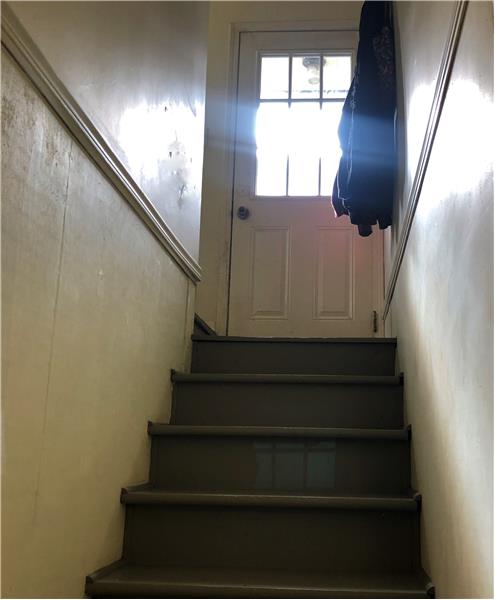 Stairs to basement that is not counted in County records of 742 ft.  Buyer to verify.
