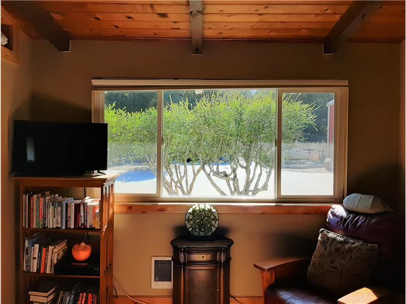 Specific trees planted for just the right amount of privacy. Hunter Douglas blinds have also been installed throughout!