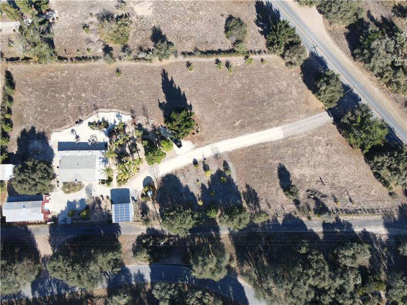 Fully fenced and Tree-lined, the 2.5 Acres Truly Provides a Private Location to finally Settle Down.