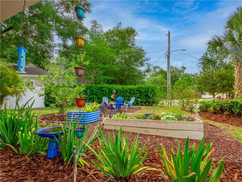 Side View with Garden and Fire Pit