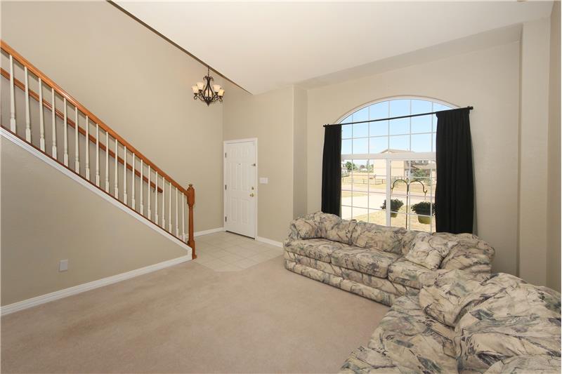 Bright living room with vaulted ceilings