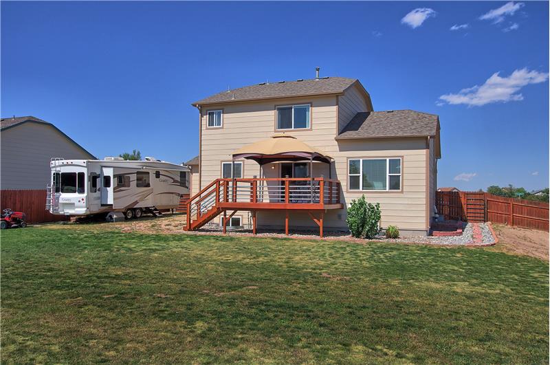 Rear view. Room for RV Parking and easy access with 12-ft gate