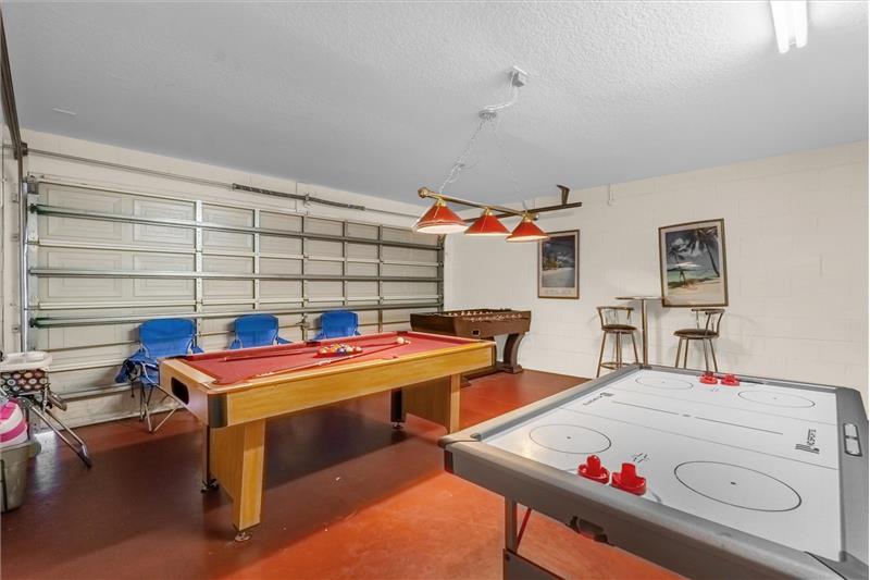 Game/Laundry Room Staged in Garage