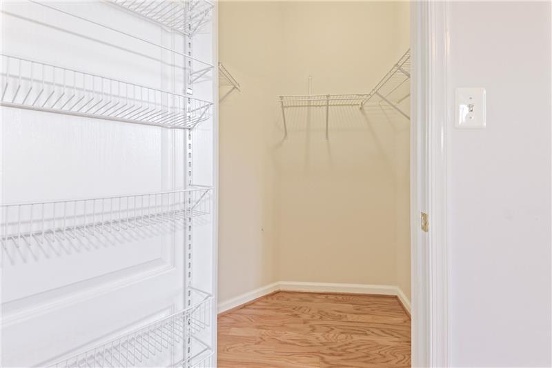 One of Two Walk-In Closets