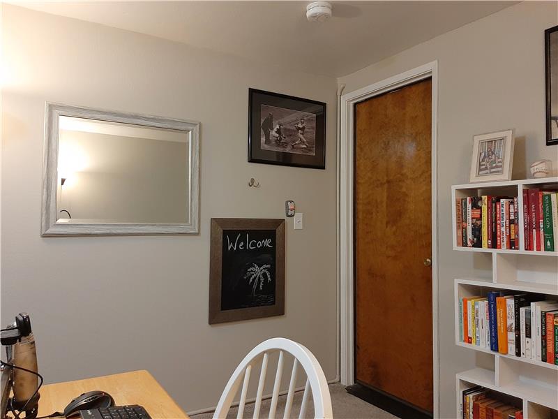 This added 'office', utilizing existing garage space, is just off the Laundry Room near Guest Bathroom. Keep it?  Y/N??