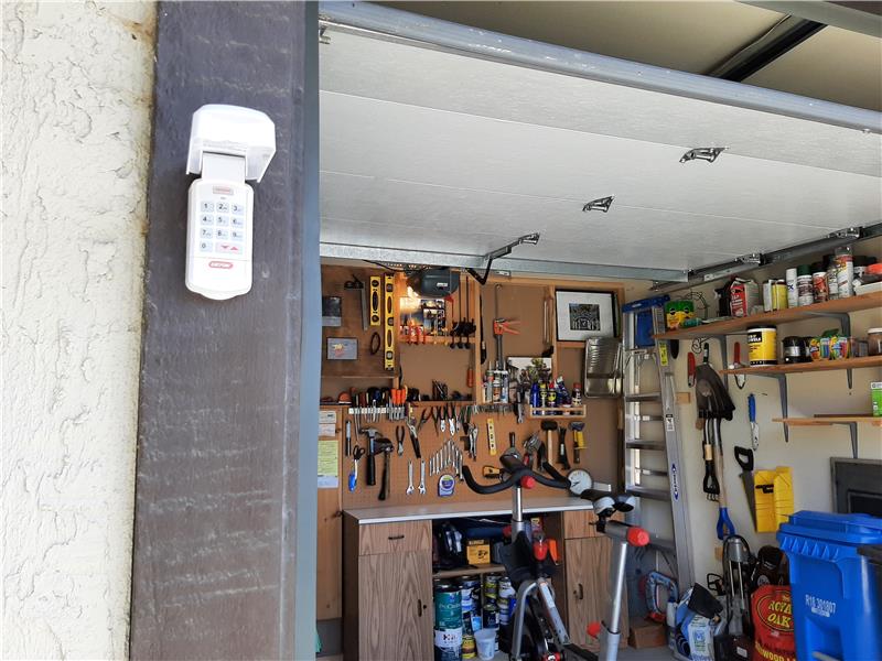 In addition to and NEW Garage Door, the NEW Garage Door Opener allows for both remote and digital entry!