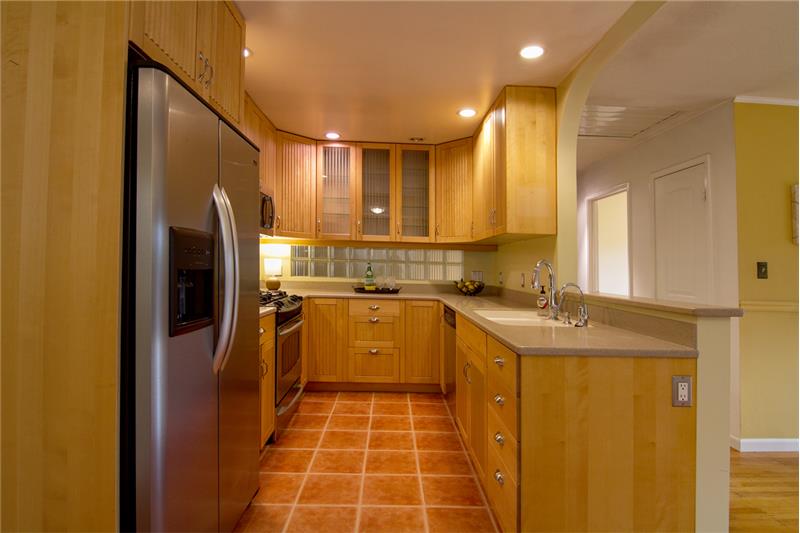 Featuring stainless appliances, under counter lighting