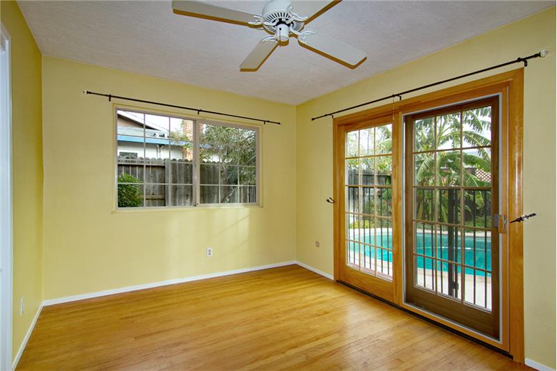 Master bedroom has sliding french doors to the pool