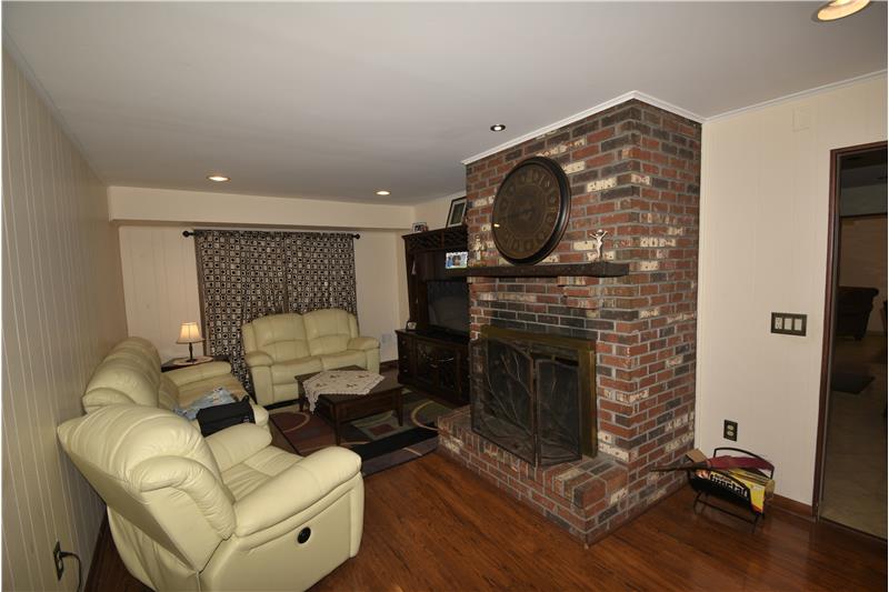 Family Room With Wood Burning Fireplace