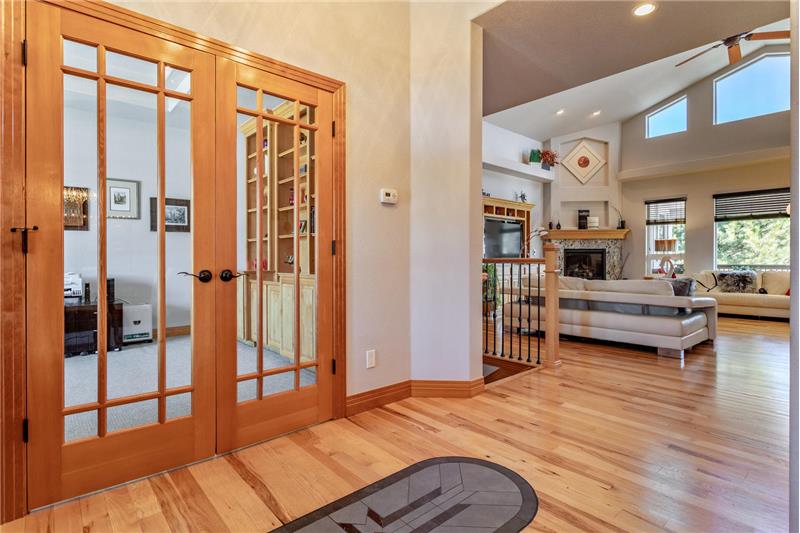 Front entrance. Doors to study and view of great room.
