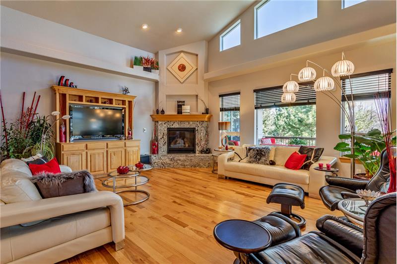 Great room has invisible surround sound speakers in walls