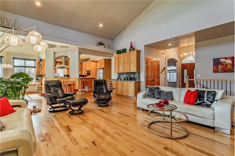View from great room fireplace toward kitchen and foyer