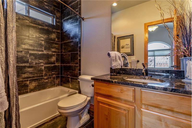 Guest bedroom has an en suite full bath