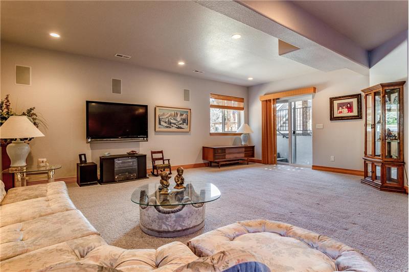Basement family room has door to back yard