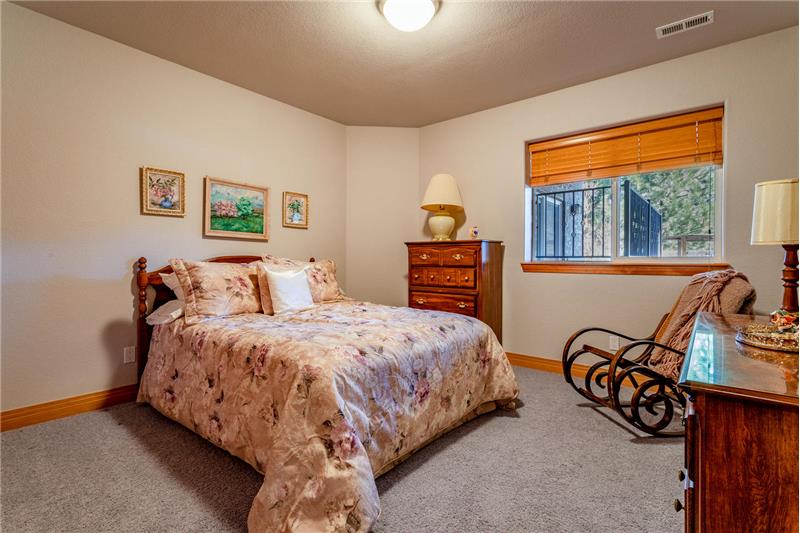 One of 3 guest bedrooms in the basement