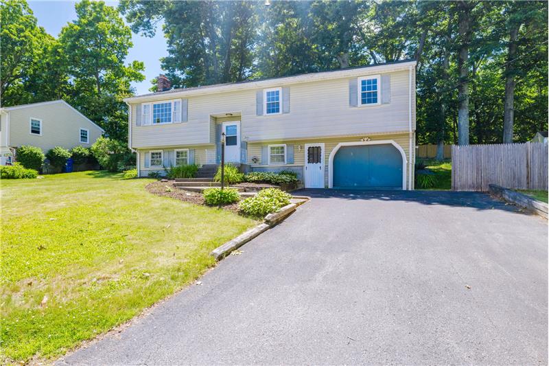 The exterior photo of 12 Sunset Drive Milford MA