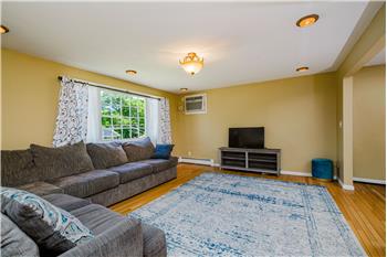 Interior of 12 Sunset Drive in Milford This is the living room