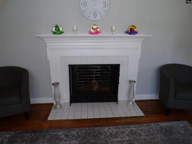 Wood burning fireplace in living room