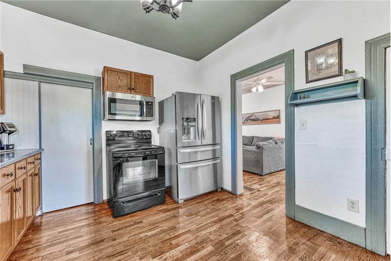 Kitchen with large pocket door pantry!