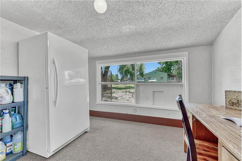 Sunroom and laundry area off of the kitchen