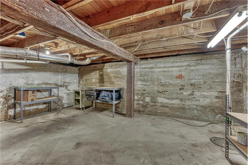 Basement is great for storage or can be used as a craft area w/6ft ceilings